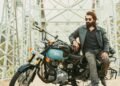 A man with a motorbike