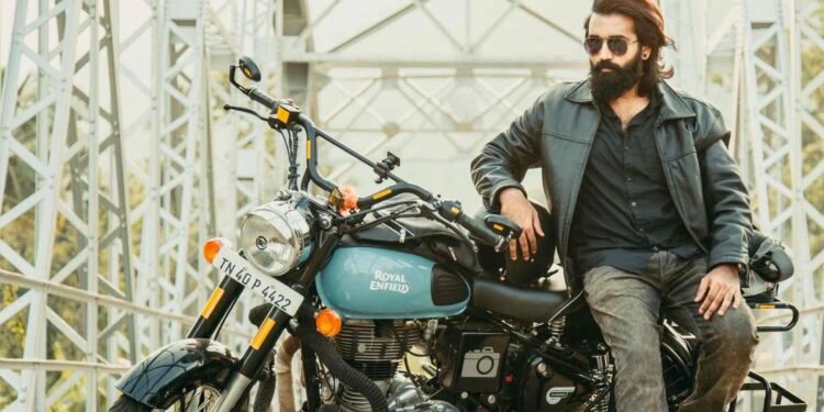 A man with a motorbike