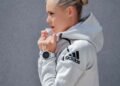 woman wearing Adidas jacket